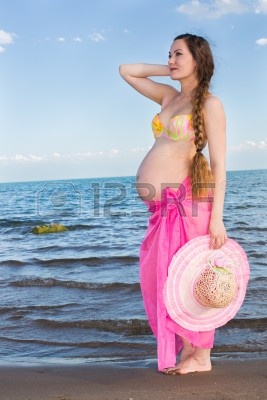 14404273-happy-beautiful-pregnan