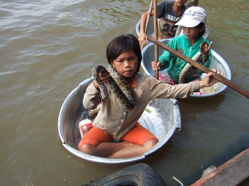 Kids in Cooking Pot Boats. Cambo