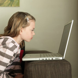 young-girl-using-computer-270-th
