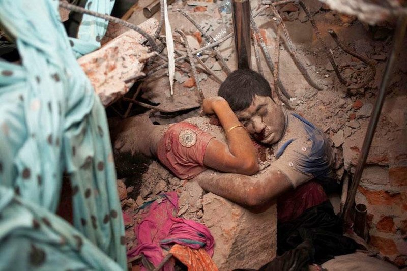 Embracing couple in the rubble o