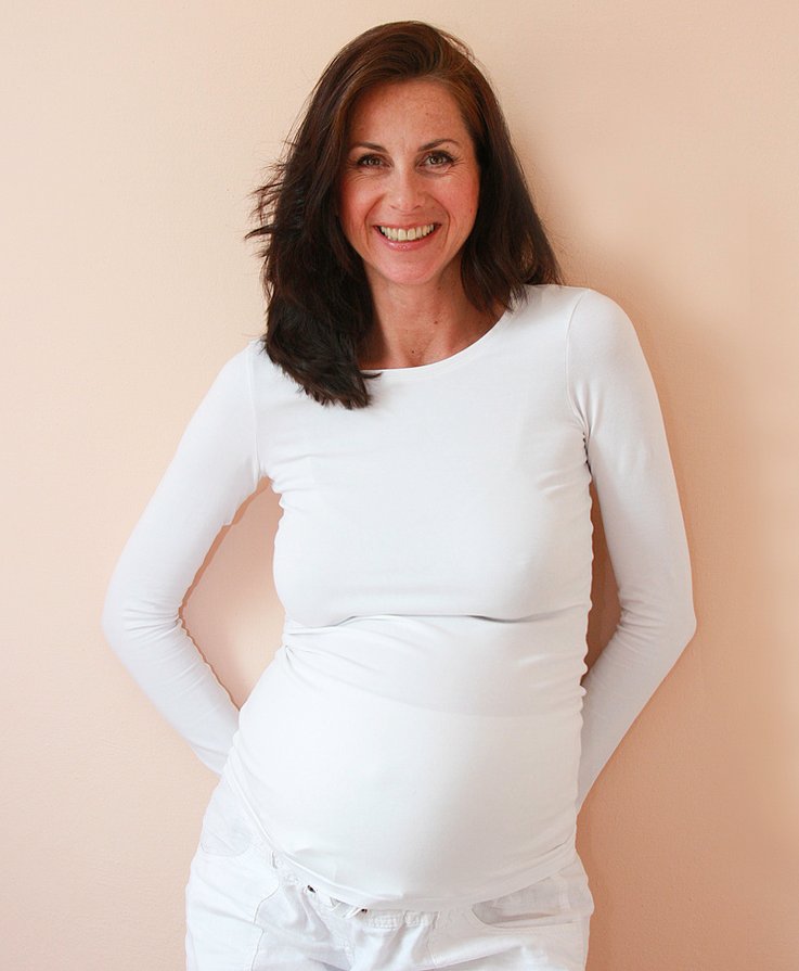 sexy pregnant mom in white smili